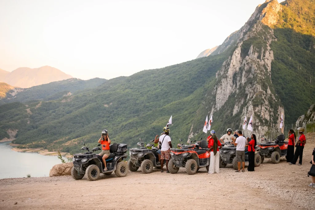 ATV Tirana guests gathered with the quad fleet at the Bovilla Lake viewpoint
