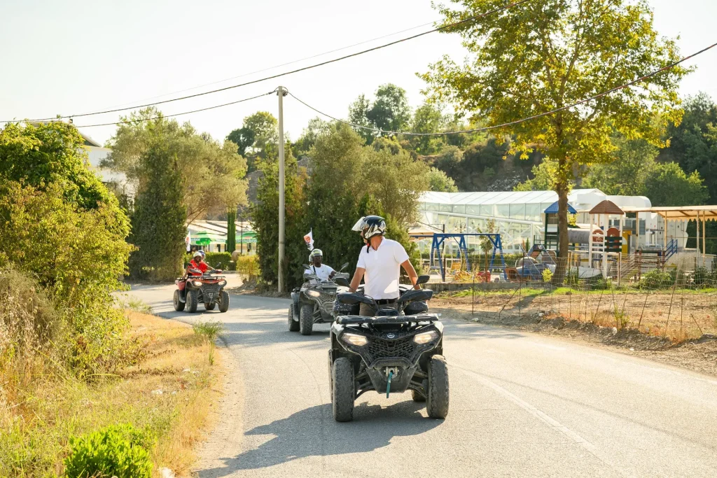 An ATV Tirana quad convoy leaving the Zall-Herr base area on a guided tour